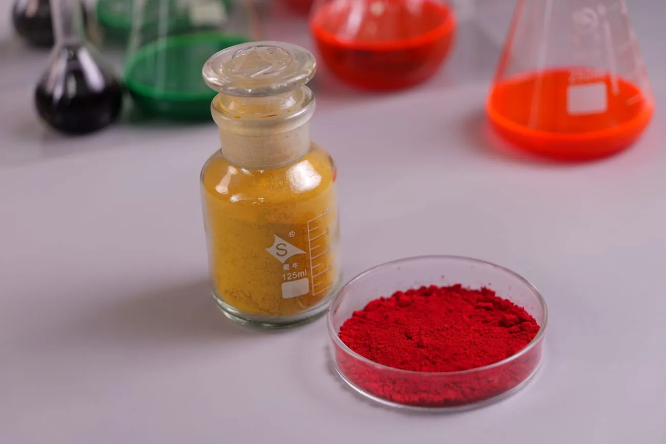 Real fluorescent pigment powders in laboratory vessels